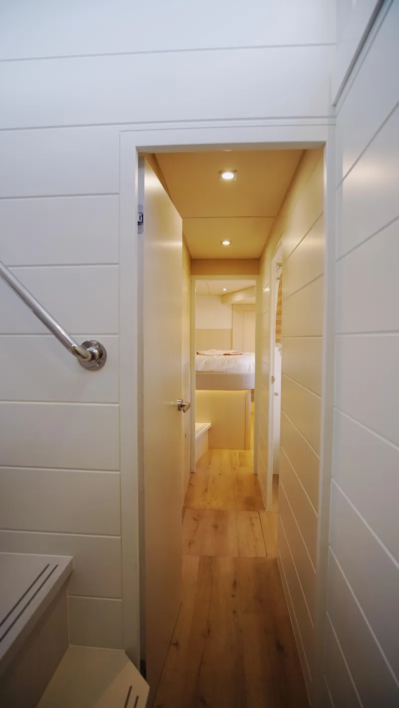 Slide: The Image of Luxurious yacht interior with modern kitchen design, featuring sleek countertops and elegant decor, Two Oceans 555 - 008. - 14