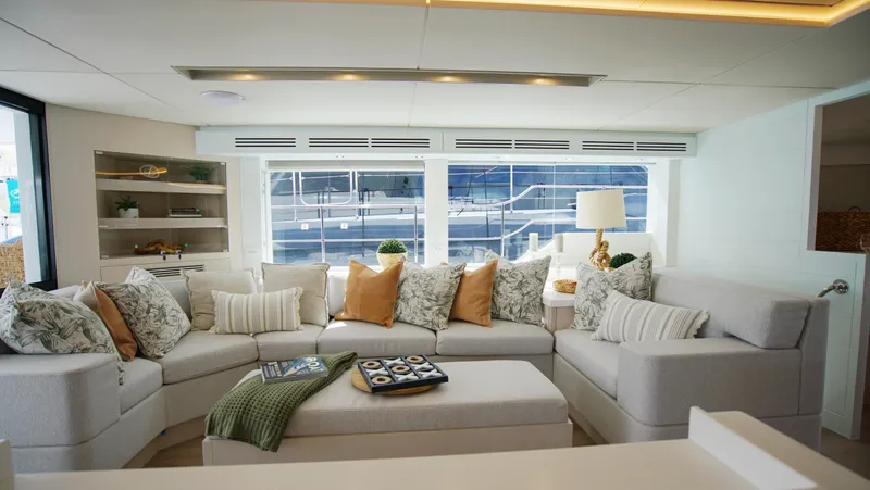 Slide: The Image of Luxury Two Oceans 555 - 008 catamaran yacht on serene ocean, 2025 model. - 3