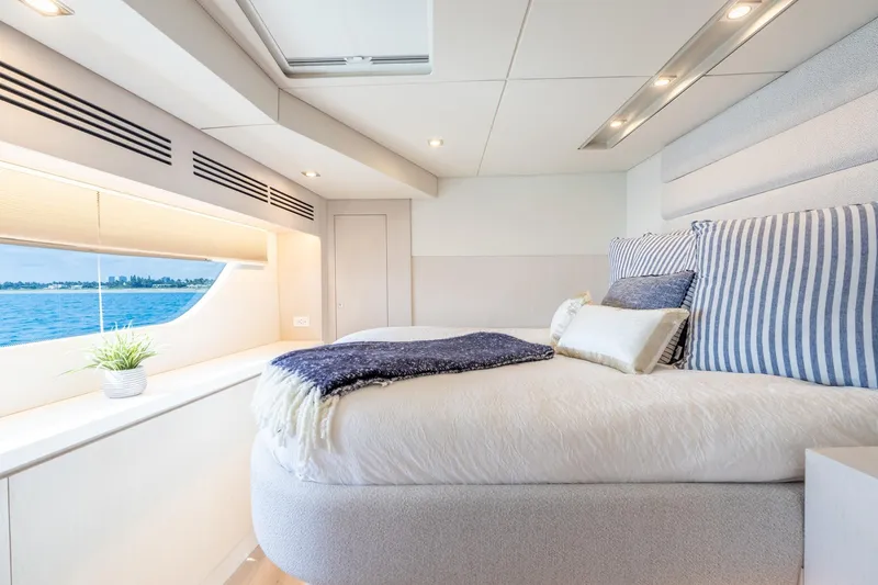 Slide: The Image of Luxurious bedroom interior on Two Oceans 555 - 008 yacht, 2025 model, with ocean view. - 31