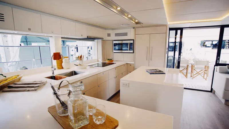 Slide: The Image of Luxurious Two Oceans 555 - 008 yacht interior, featuring elegant dining area and ocean view. - 5