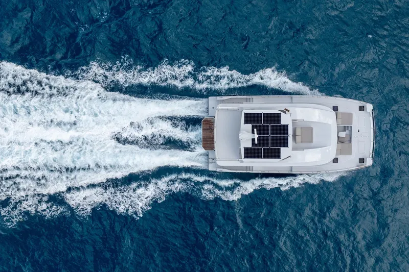Slide: The Image of Aerial view of Two Oceans 555 - 008 yacht with solar panels, cruising in blue ocean, 2025 model. - 65