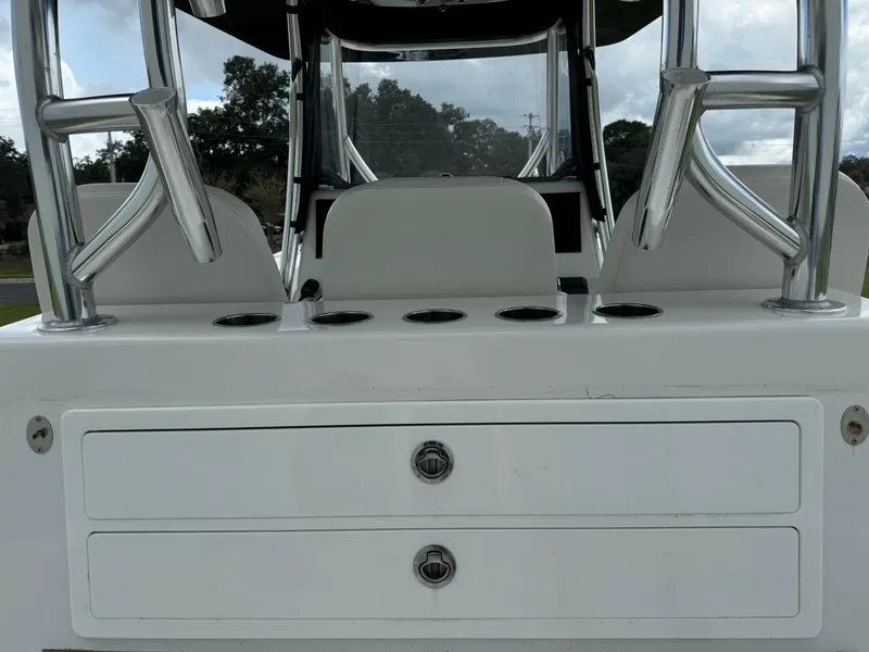 Slide: The Image of 2023 Front Runner 36 Center Console boat with rod holders and storage drawers. - 13