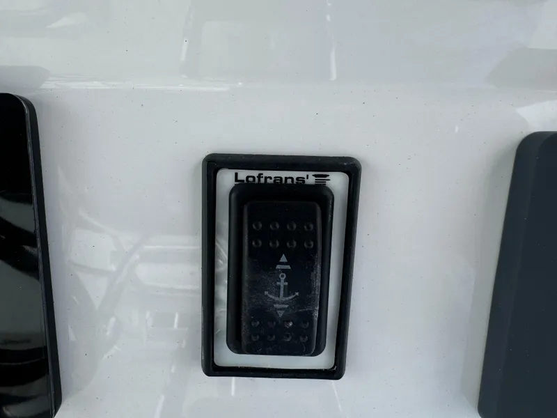 Slide: The Image of Control panel on 2023 Front Runner 36 Center Console boat. - 24