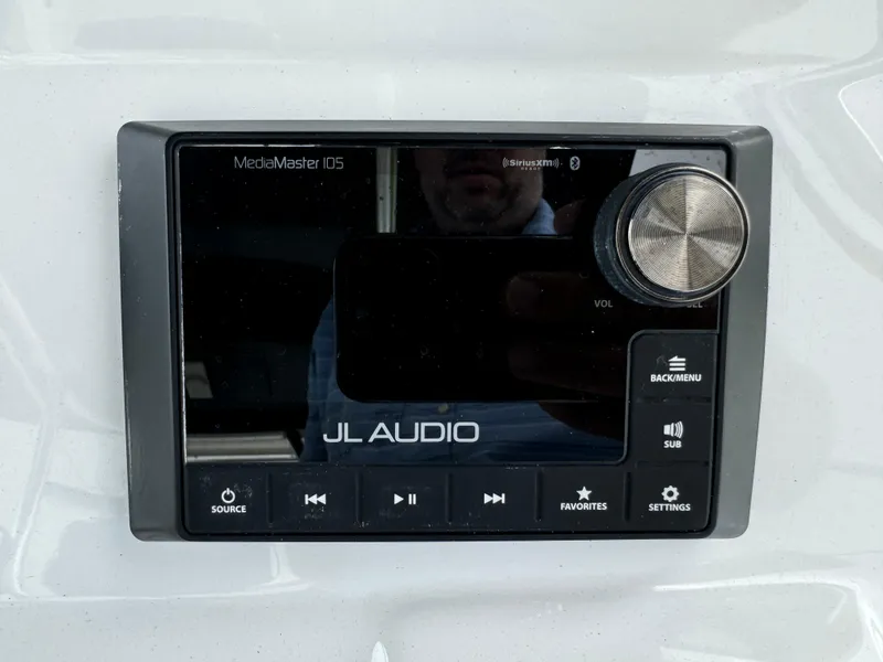 Slide: The Image of JL Audio MediaMaster 105 control panel on 2023 Front Runner 36 Center Console. - 25