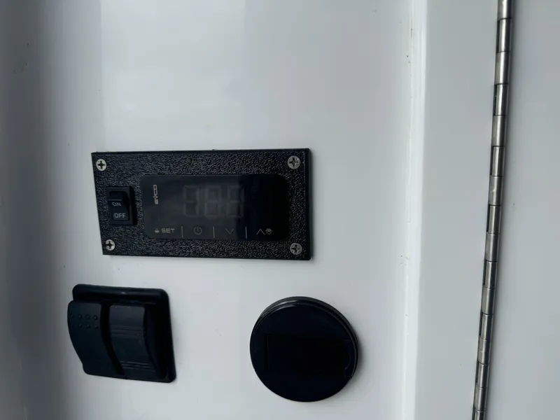 Slide: The Image of Control panel on 2023 Front Runner 36 Center Console boat. - 31