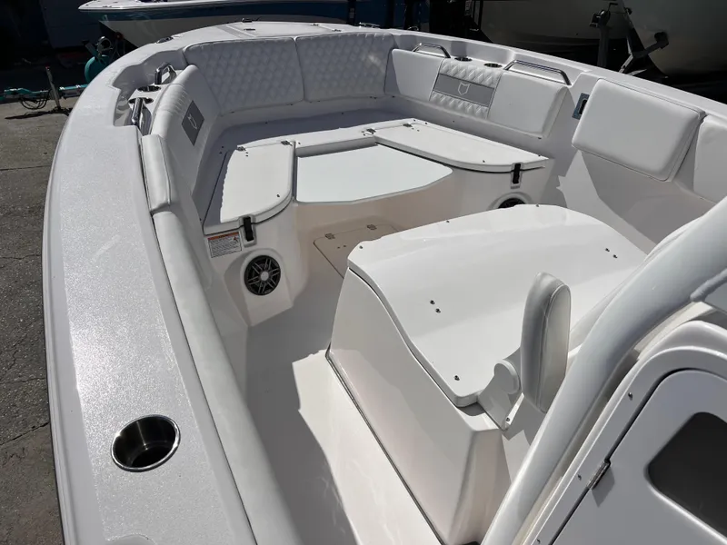Slide: The Image of 2025 Sea Fox 268 Commander boat interior with seating and storage compartments. - 11