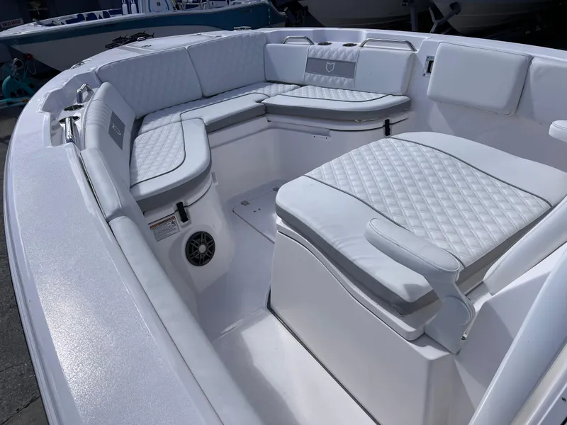 Slide: The Image of 2025 Sea Fox 268 Commander boat interior with cushioned seating and sleek design. - 12