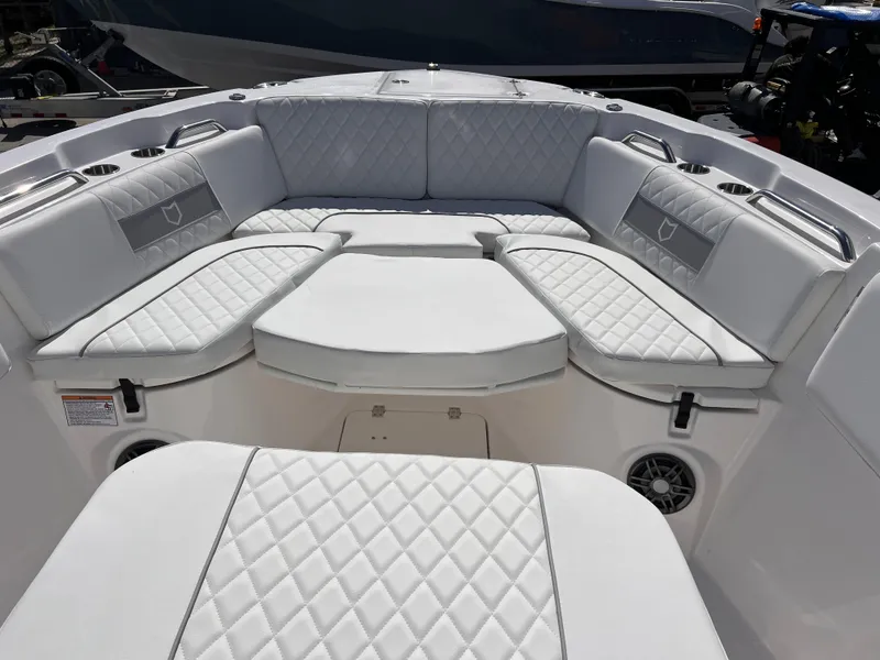 Slide: The Image of 2025 Sea Fox 268 Commander boat interior with white quilted seating. - 16
