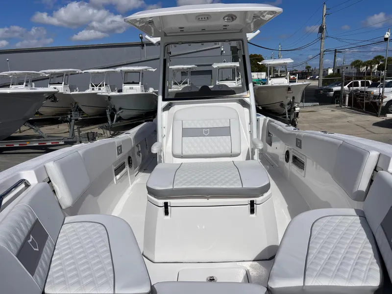 Slide: The Image of 2025 Sea Fox 268 Commander boat interior with white seating and modern design. - 18