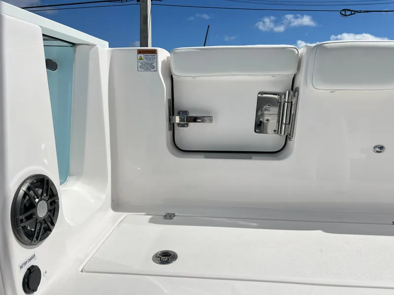 Slide: The Image of 2025 Sea Fox 268 Commander boat interior with storage compartment and speaker. - 36