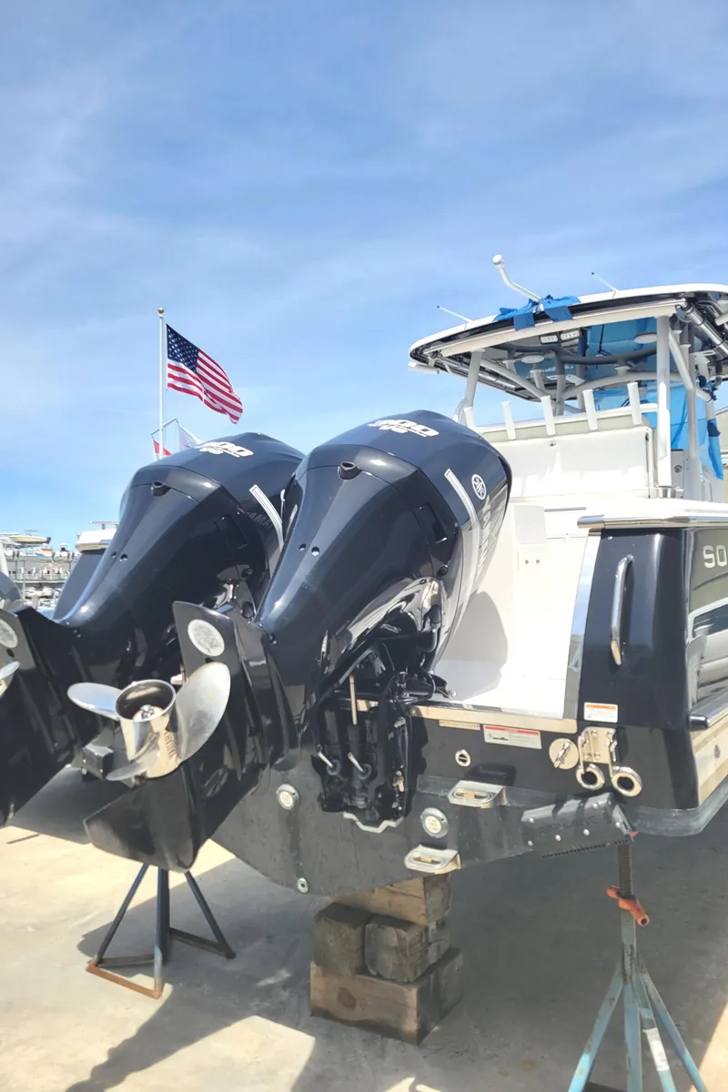 Slide: The Image of 2020 Southport 33 FE boat with dual outboard motors on display. - 7