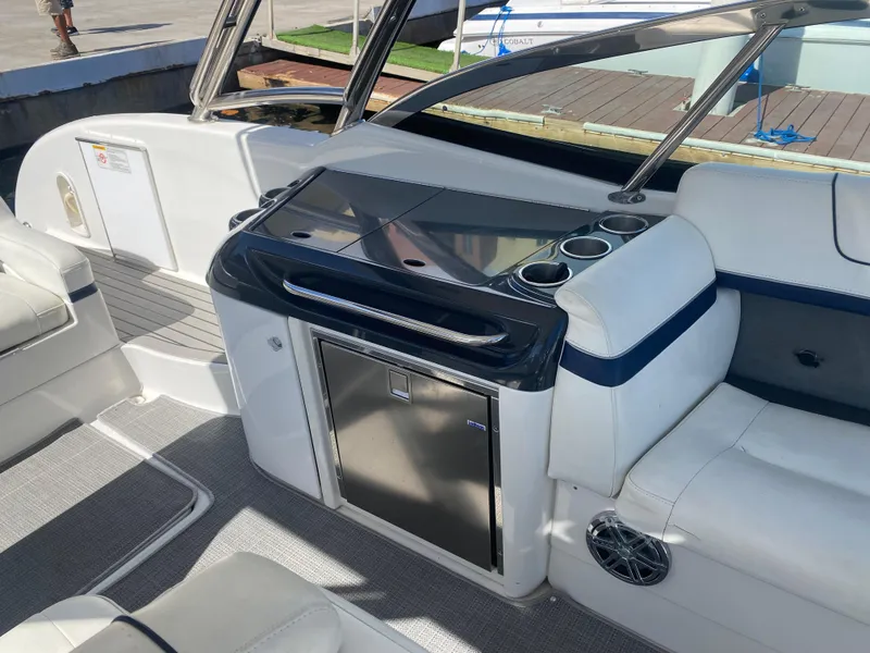 Slide: The Image of 2016 Formula 350 Crossover Bowrider interior with sleek seating and modern amenities. - 14