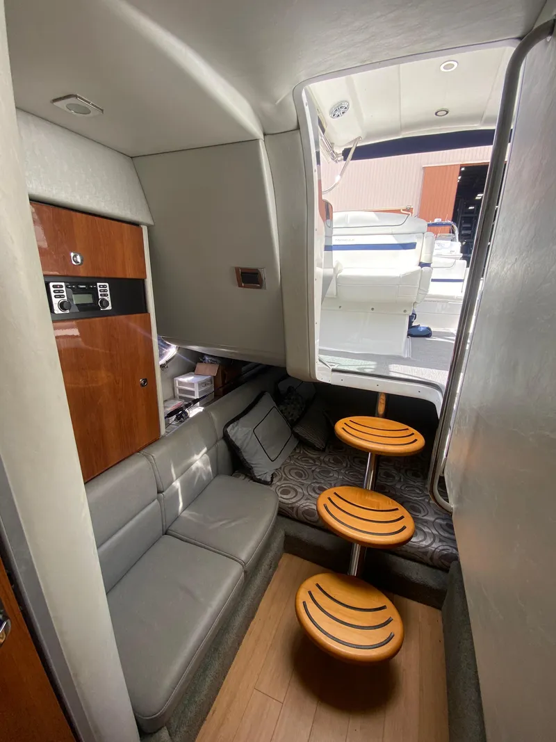 Slide: The Image of Interior of 2016 Formula 350 Crossover Bowrider with seating and table. - 23