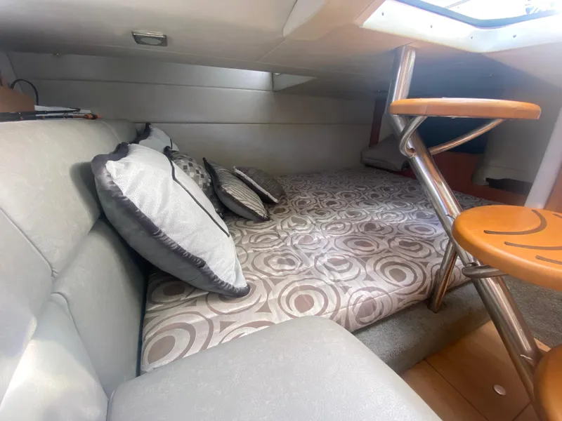 Slide: The Image of Interior cabin of 2016 Formula 350 Crossover Bowrider with cozy bedding and seating. - 24