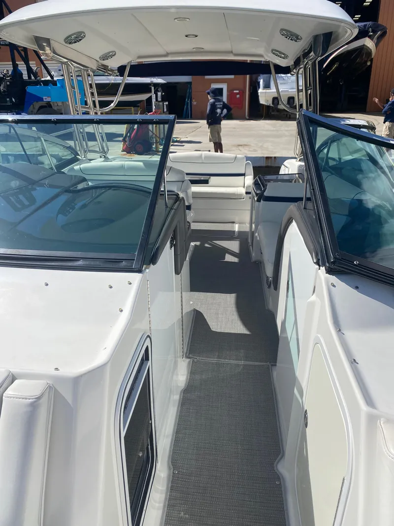 Slide: The Image of 2016 Formula 350 Crossover Bowrider, sleek design, spacious deck, luxury boating experience. - 7