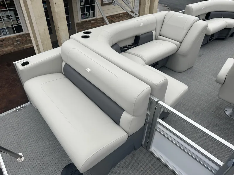 Slide: The Image of 2024 Starcraft LX 20 CB boat interior with plush seating and modern design. - 13