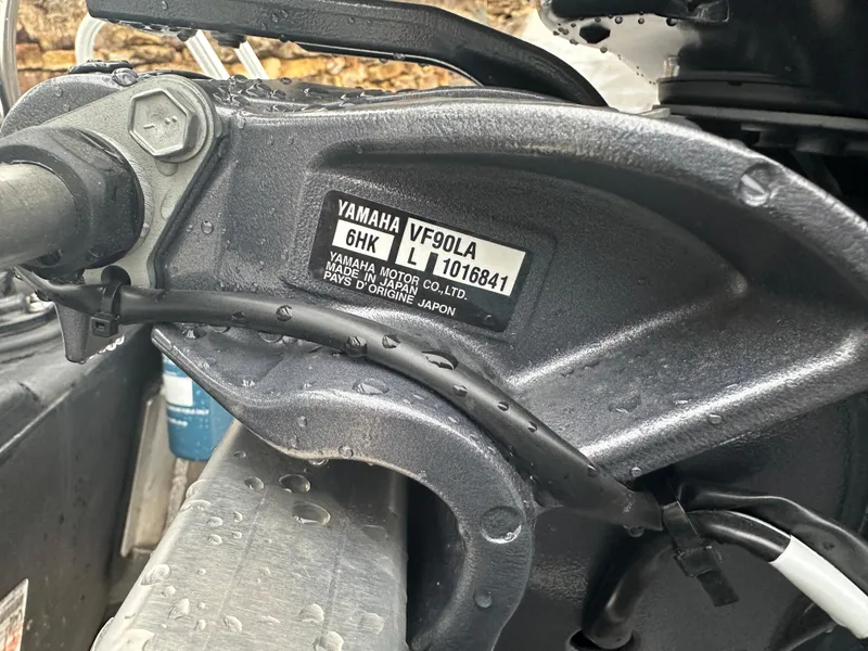 Slide: The Image of Close-up of a Yamaha VF90LA engine part on a 2024 Starcraft LX 20 CB boat. - 18