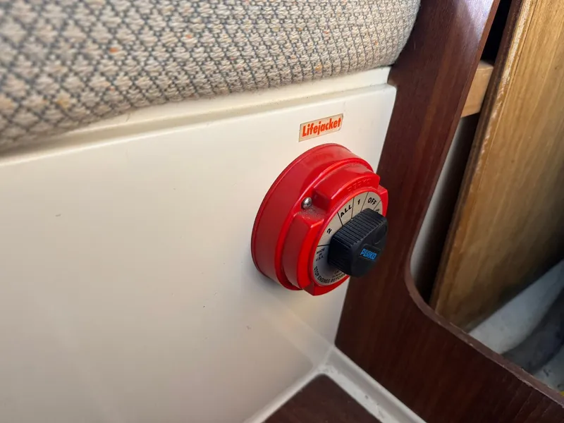 Slide: The Image of Red control knob on 1984 Canadian Sailcraft 36 interior panel. - 20