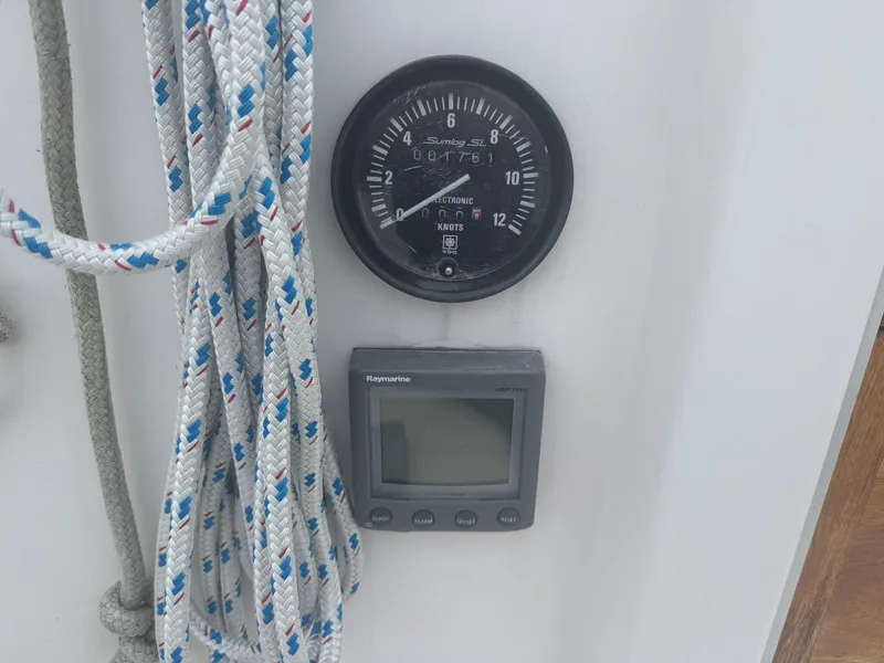 Slide: The Image of Instrument panel on 1984 Canadian Sailcraft 36 sailboat with ropes and gauges. - 39
