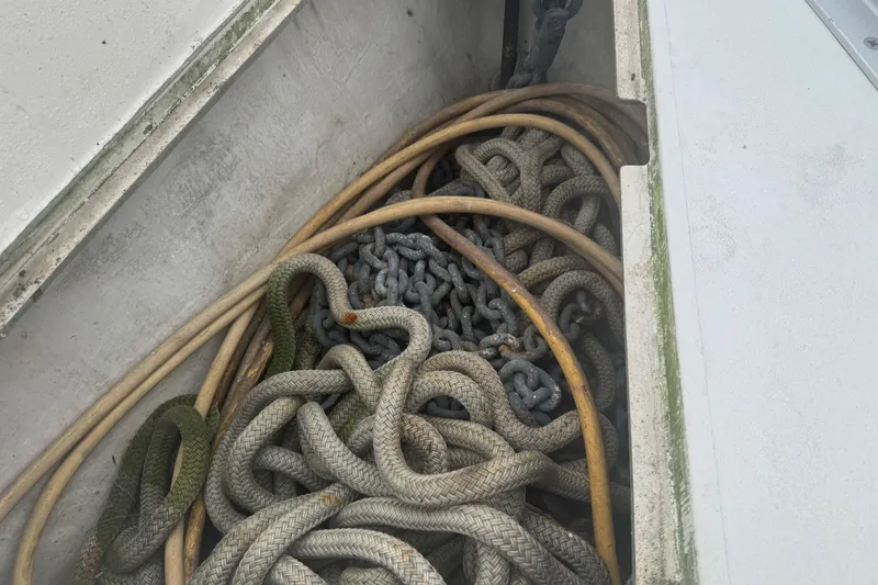 Slide: The Image of Tangled ropes and chains in a Canadian Sailcraft 36 sailboat, 1984 model. - 49