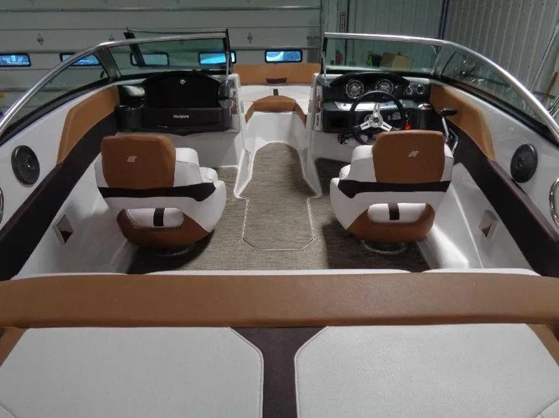 Slide: The Image of 2017 Four Winns Horizon 190 boat interior with brown and white seating. - 11
