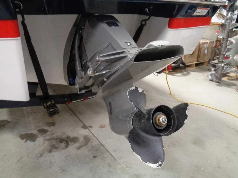 Slide: The Image of Damaged propeller of 2017 Four Winns Horizon 190 boat in garage. - 12