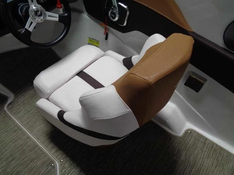 Slide: The Image of 2017 Four Winns Horizon 190 boat interior with brown and white seating. - 14
