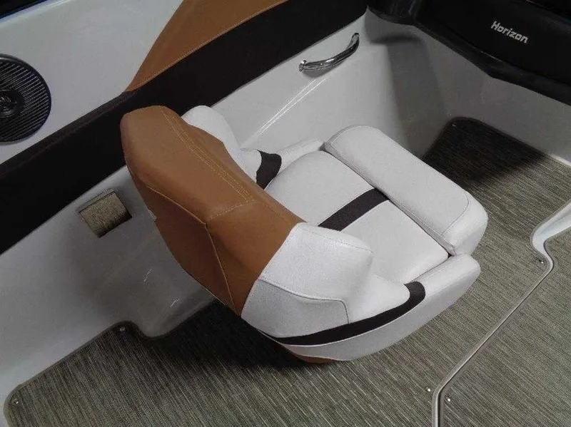 Slide: The Image of 2017 Four Winns Horizon 190 boat seat with brown and white upholstery. - 17