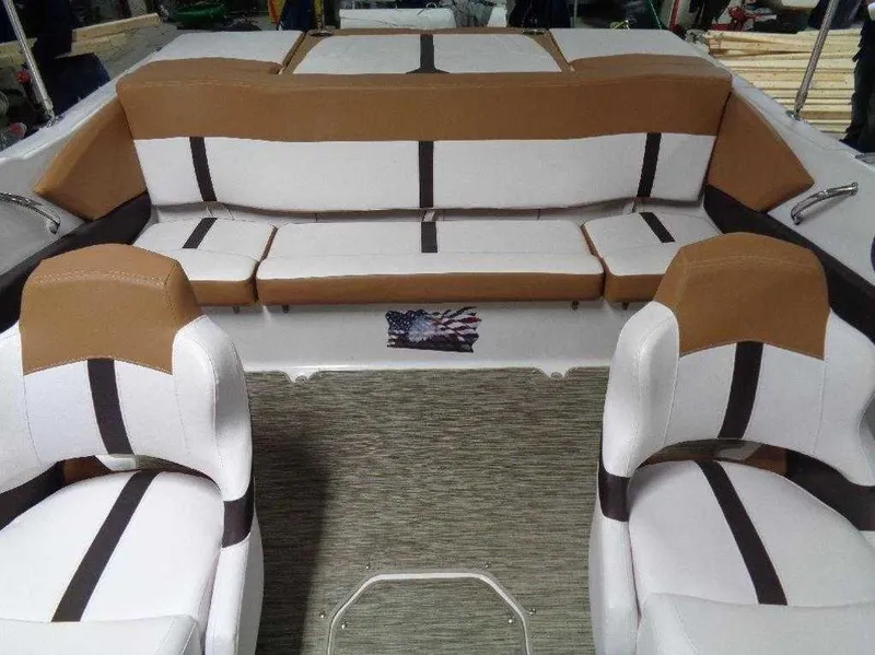 Slide: The Image of 2017 Four Winns Horizon 190 boat interior with brown and white seating. - 7
