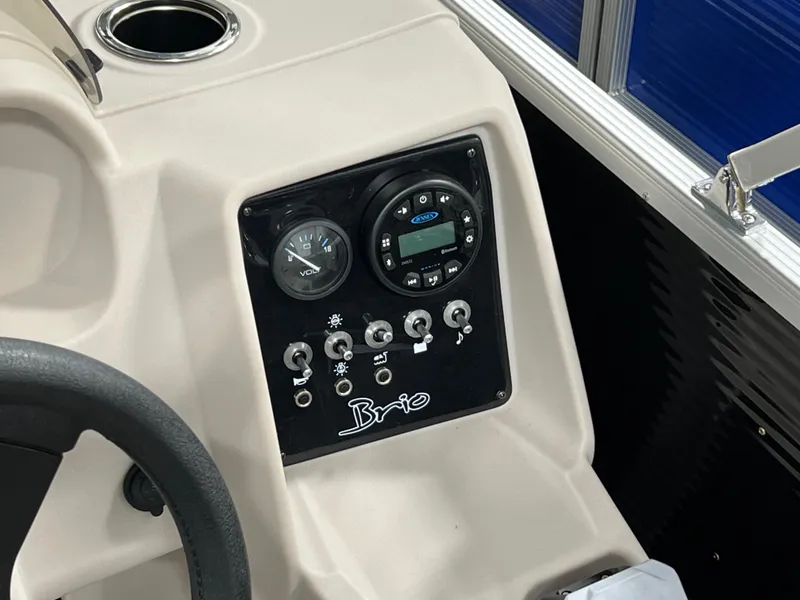 Slide: The Image of Control panel of 2023 Princecraft Brio Electric 170 boat with gauges and switches. - 12