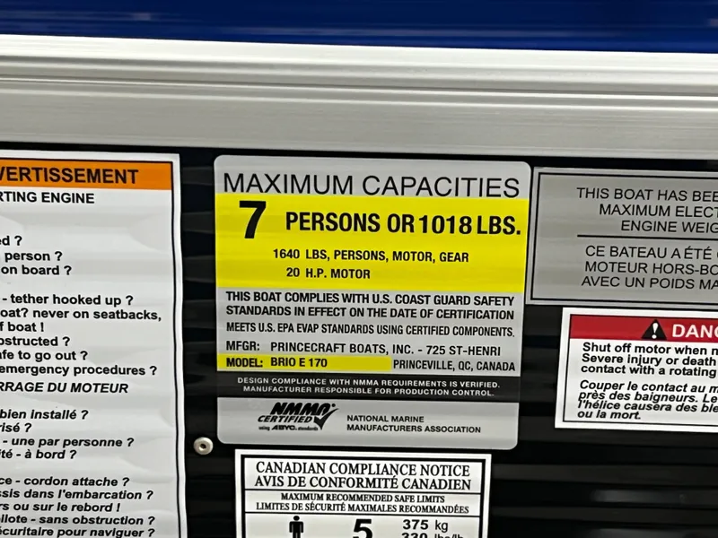 Slide: The Image of Capacity label for 2023 Princecraft Brio Electric 170, max 7 people or 1018 lbs. - 15