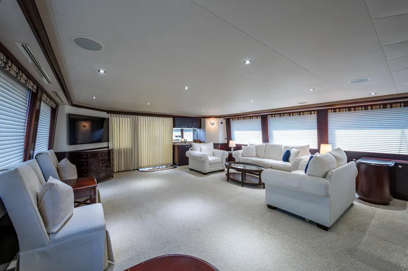 Slide: The Image of Luxurious interior of 2002 Westport 112 yacht with elegant seating and modern decor. - 18