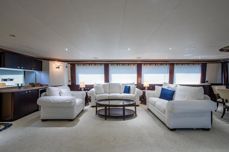 Slide: The Image of Luxurious interior of 2002 Westport 112 yacht with elegant white sofas and modern decor. - 19