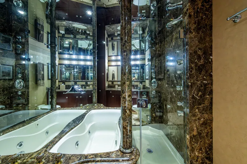 Slide: The Image of Luxurious marble bathroom interior on a 2002 Westport 112 yacht. - 30