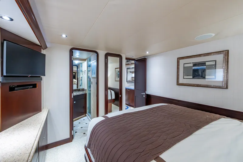 Slide: The Image of Luxurious bedroom interior of 2002 Westport 112 yacht with modern amenities. - 46