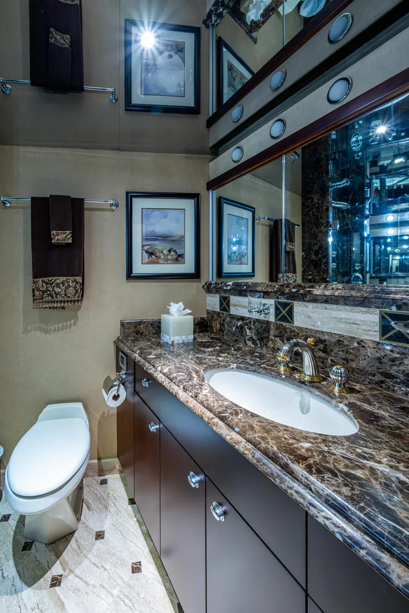 Slide: The Image of Luxurious bathroom in 2002 Westport 112 yacht with marble countertop and elegant decor. - 54