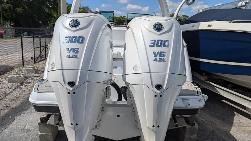 Slide: The Image of Twin Yamaha 300 V6 outboard engines on a 2025 Four Winns H9 OB boat. - 3