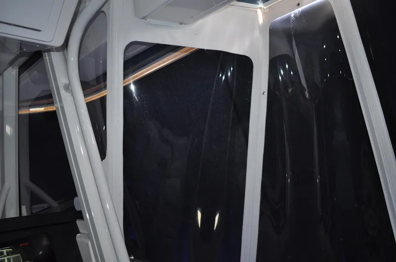 Slide: The Image of 2023 Regulator 34 boat interior with sleek, modern design and clear windows. - 21