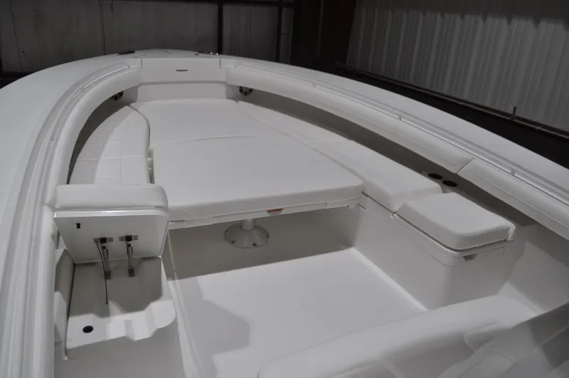 Slide: The Image of 2023 Regulator 34 boat interior with spacious seating and sleek design. - 4