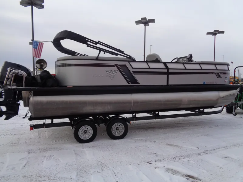 Slide: The Image of 2023 Viaggio LAGO V 22E pontoon boat on trailer in snowy setting. - 5
