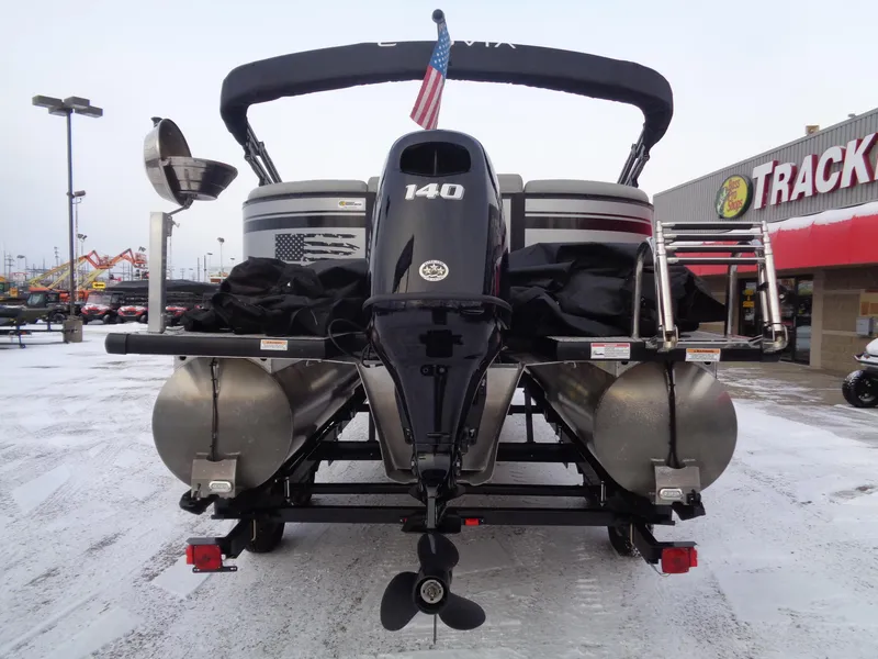 Slide: The Image of 2023 Viaggio LAGO V 22E pontoon boat with 140 HP engine, displayed outdoors. - 6