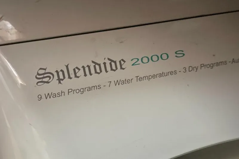 Slide: The Image of Splendide 2000 S washer with 9 wash programs, 7 water temperatures, 3 dry programs. - 45