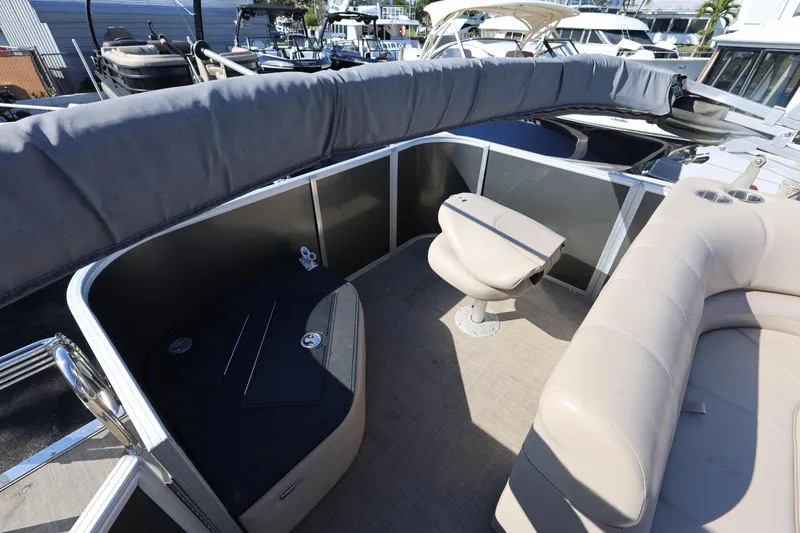 Slide: The Image of 2017 Ranger Reata 200F boat interior with seating and storage compartments. - 33