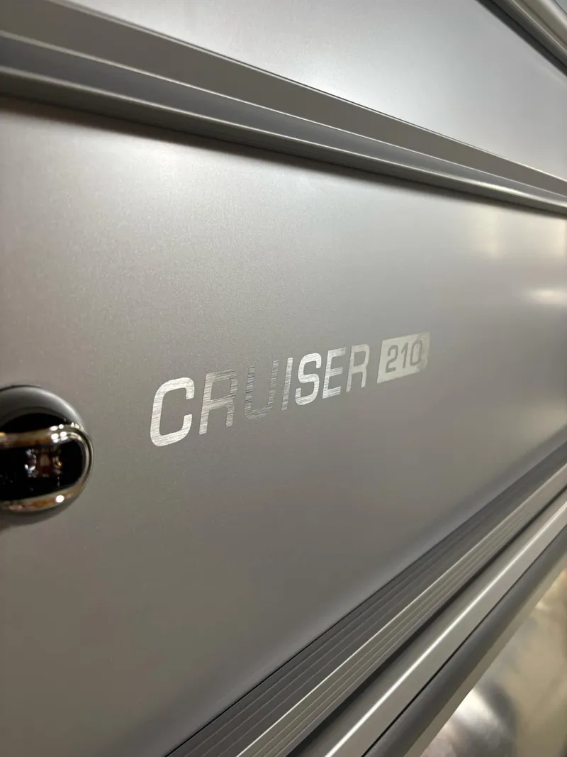 Slide: The Image of Close-up of 2025 Harris CRUISER 230 SL exterior with sleek metallic finish. - 12