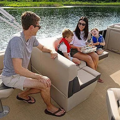 Slide: The Image of Family enjoying a day on a 2025 Harris Cruiser 230 boat. - 12