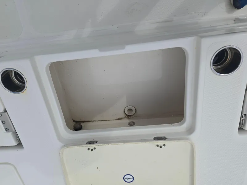 Slide: The Image of 2019 NauticStar 244 XTS boat compartment with open storage area. - 12