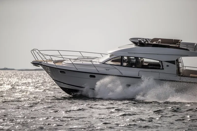 The Image of Nimbus 405 Flybridge 2017 yacht cruising on open water. - 0