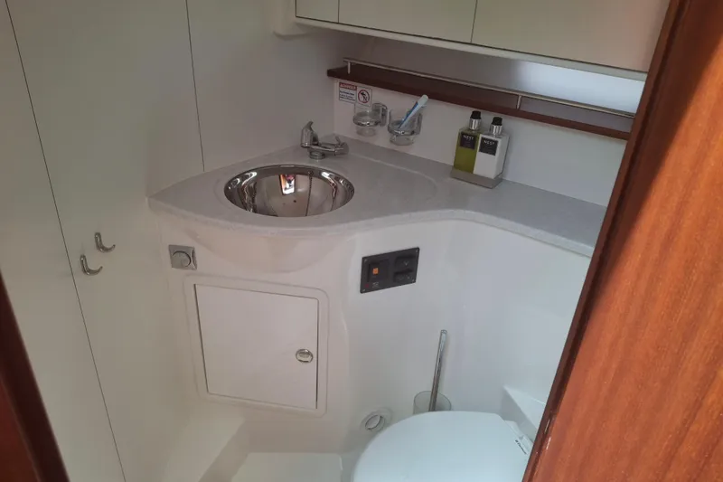 Slide: The Image of Luxurious bathroom interior of 2017 Nimbus 405 Flybridge yacht with modern fixtures. - 14