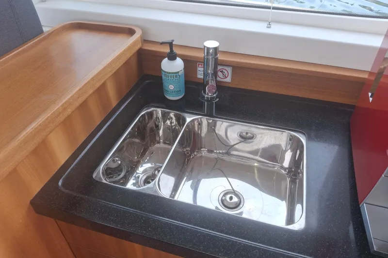 Slide: The Image of Stainless steel sink in 2017 Nimbus 405 Flybridge yacht kitchen area. - 26