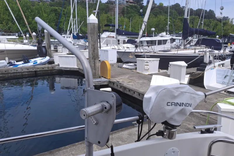 Slide: The Image of Nimbus 405 Flybridge 2017 at marina with fishing equipment and sailboats in background. - 9